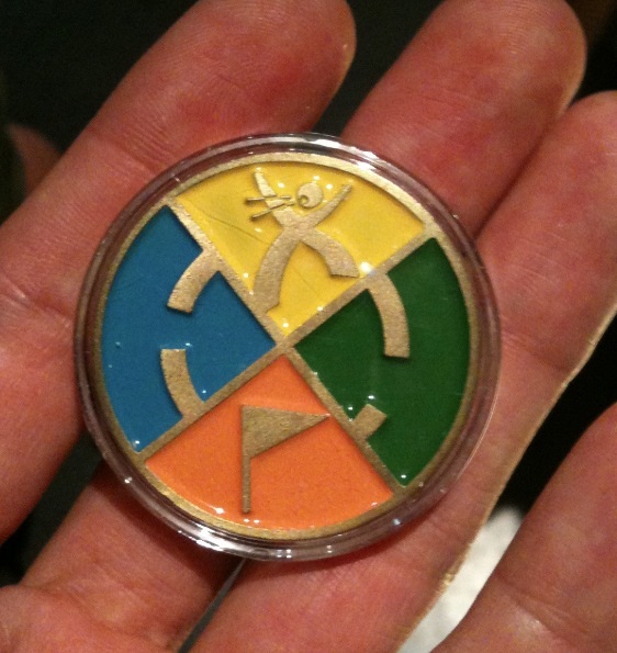 annie's hand with the first geocoin