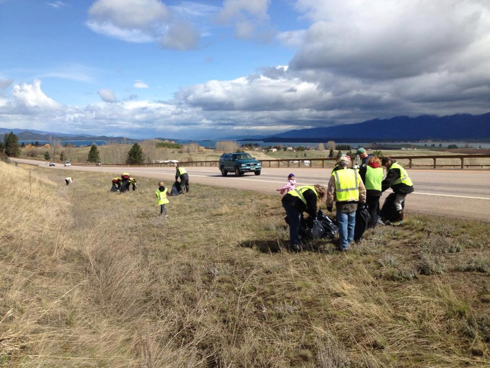 Geocachers in Montana cleaning the roadside. 
