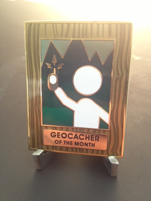 The earned, never for sale, Geocacher of the Month geocoin (sun flare optional) 