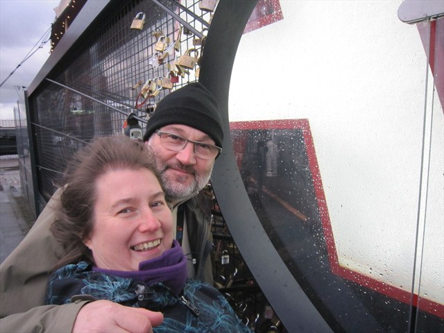 Two geocachers showing some love. Photo by Sa Lu