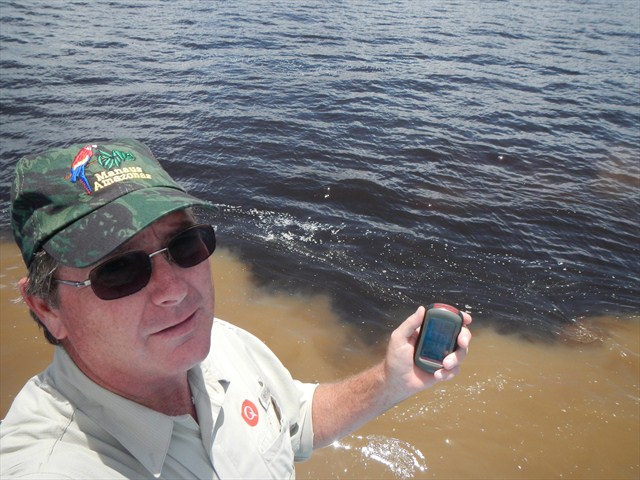 Making the find. Photo by geocacher msstrong