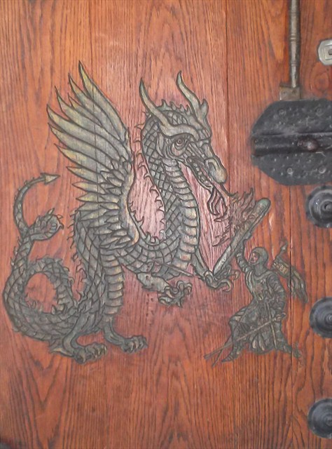Hand-carved details on the door. Photo by geocacher Iscandar