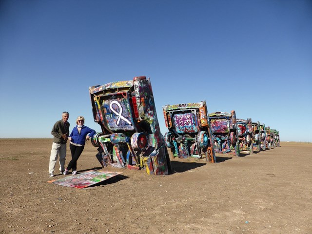 The Platonas Two hanging out with the cars.