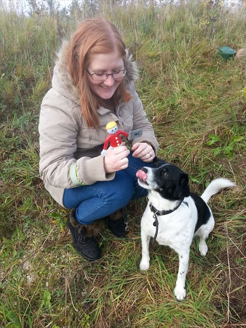 Maja with CITO the dog thinking about trackables