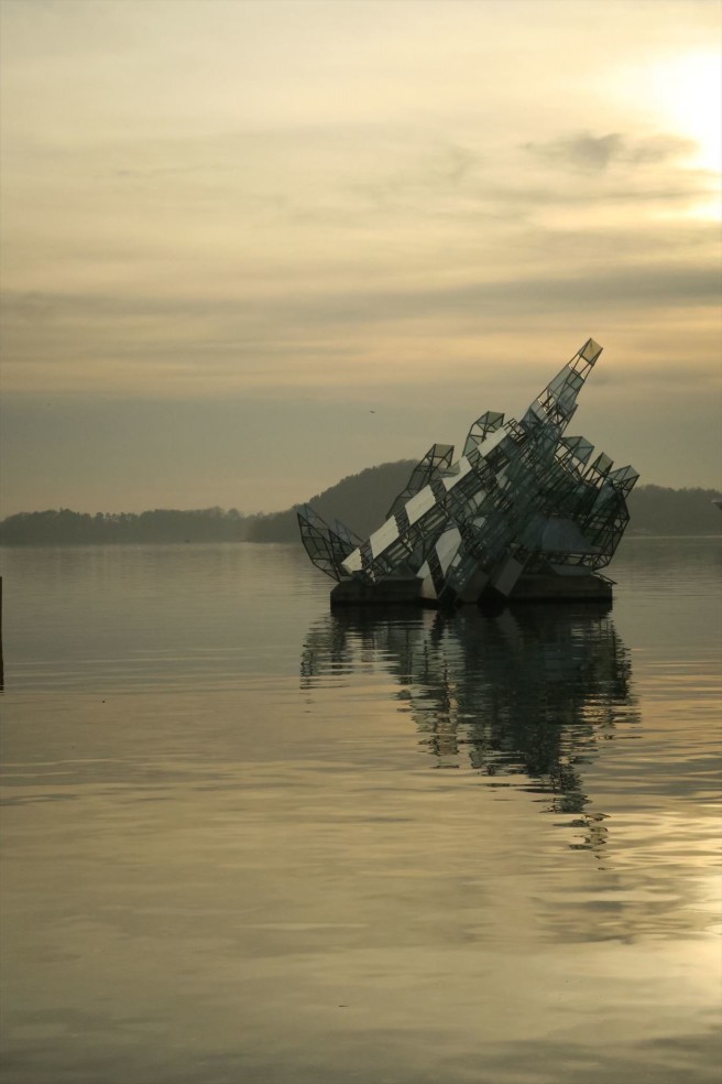"She Lies" sculpture in Oslo Harbor.