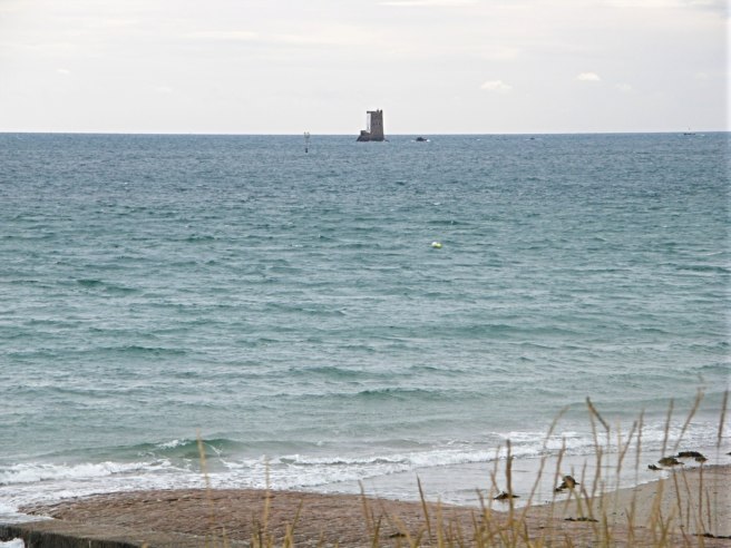 Seymour Tower from the shore at high tide