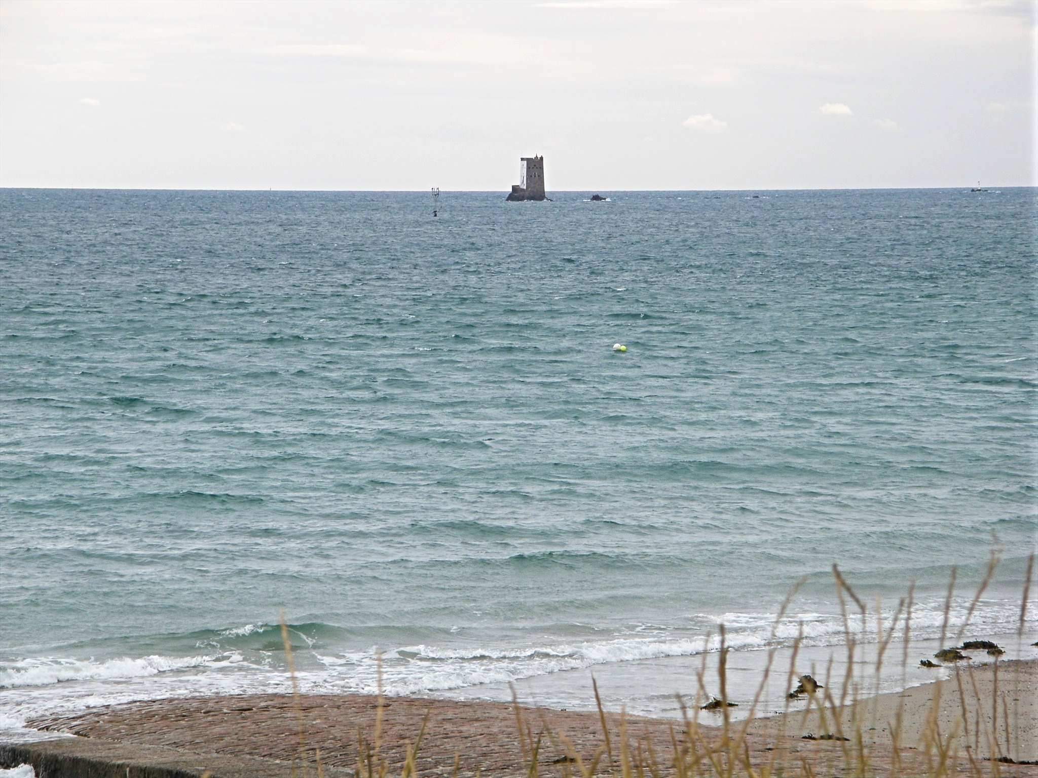 Seymour Tower from the shore at high tide