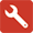 white wrench on red background